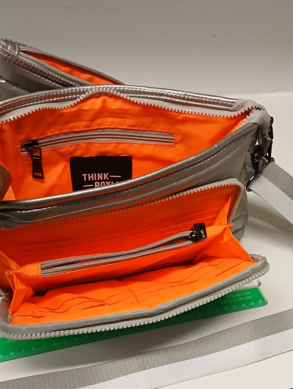 THINK ROYLN Silver Messenger Bag with Bright Orange Lining